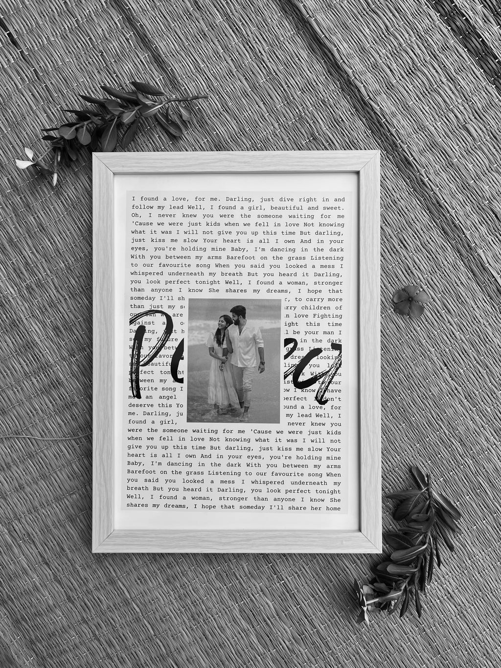 Close-up of lyrics and photo centerpiece – wedding or birthday keepsake
