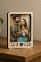 Wooden fridge magnet with engraved couple names and heart icon